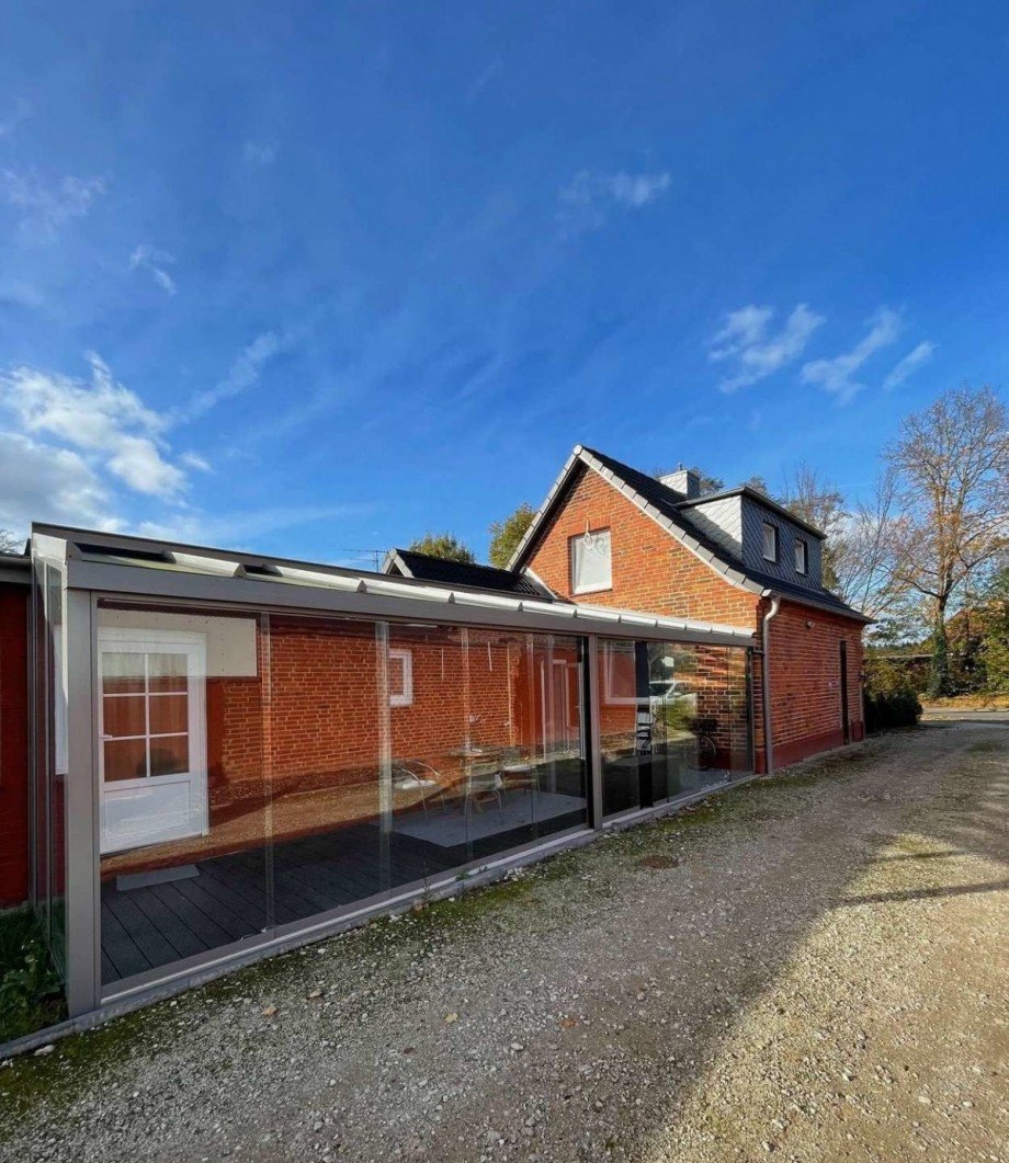 Hausr�ckseite mit Wintergarten Haus L�beck