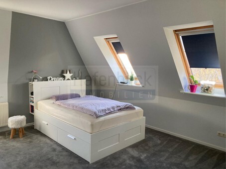 Schlafzimmer.DG Mehrfamilienhaus Heikendorf