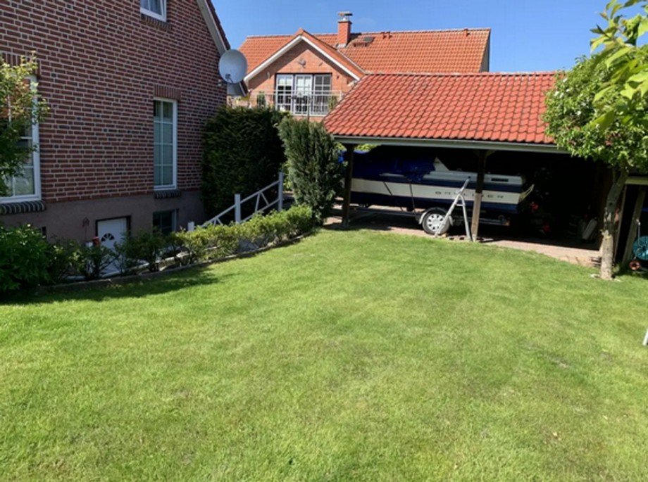 Carport, Eingang Ferienwohnung Einfamilienhaus Scharbeutz
