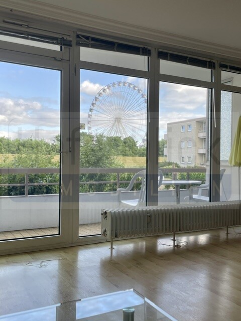 Blick aus der Sofaecke auf das Riesenrad (2) Etagenwohnung Gr�mitz