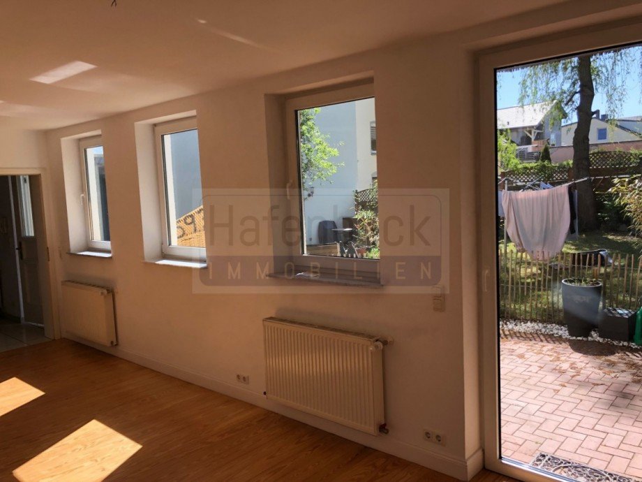 Wohnzimmer mit Blick nach drau�en Einfamilienhaus Kiel / Pries