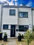 Hauptbild Modernisiertes Reihenhaus mit Split-Level-Architektur in begehrter Lage von Ammersbek