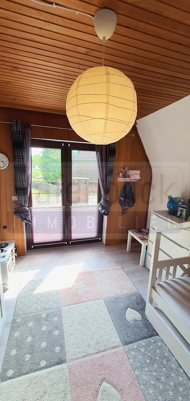 Schlafzimmer mit Balkont�r zur Dachterrasse Einfamilienhaus Rendsburg